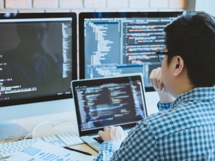 Business Man Coding